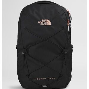 The North Face Black Backpack with Padded Straps and Modern Design